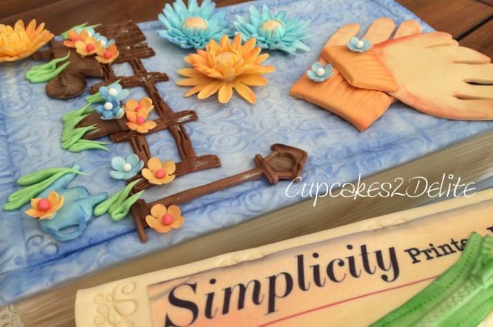Travelling, Sewing & Gardening Book Cake
